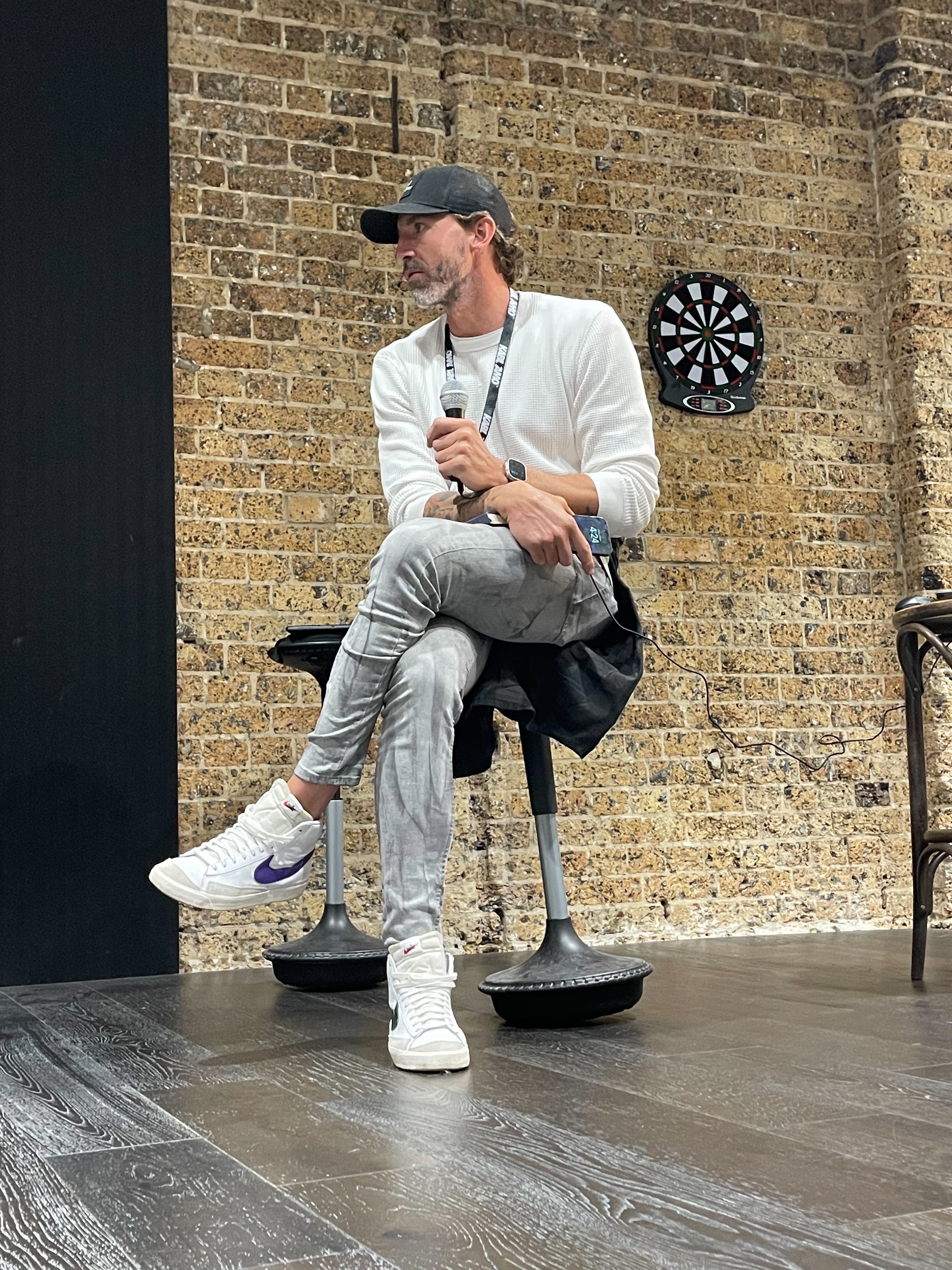 Allan speaking at an event